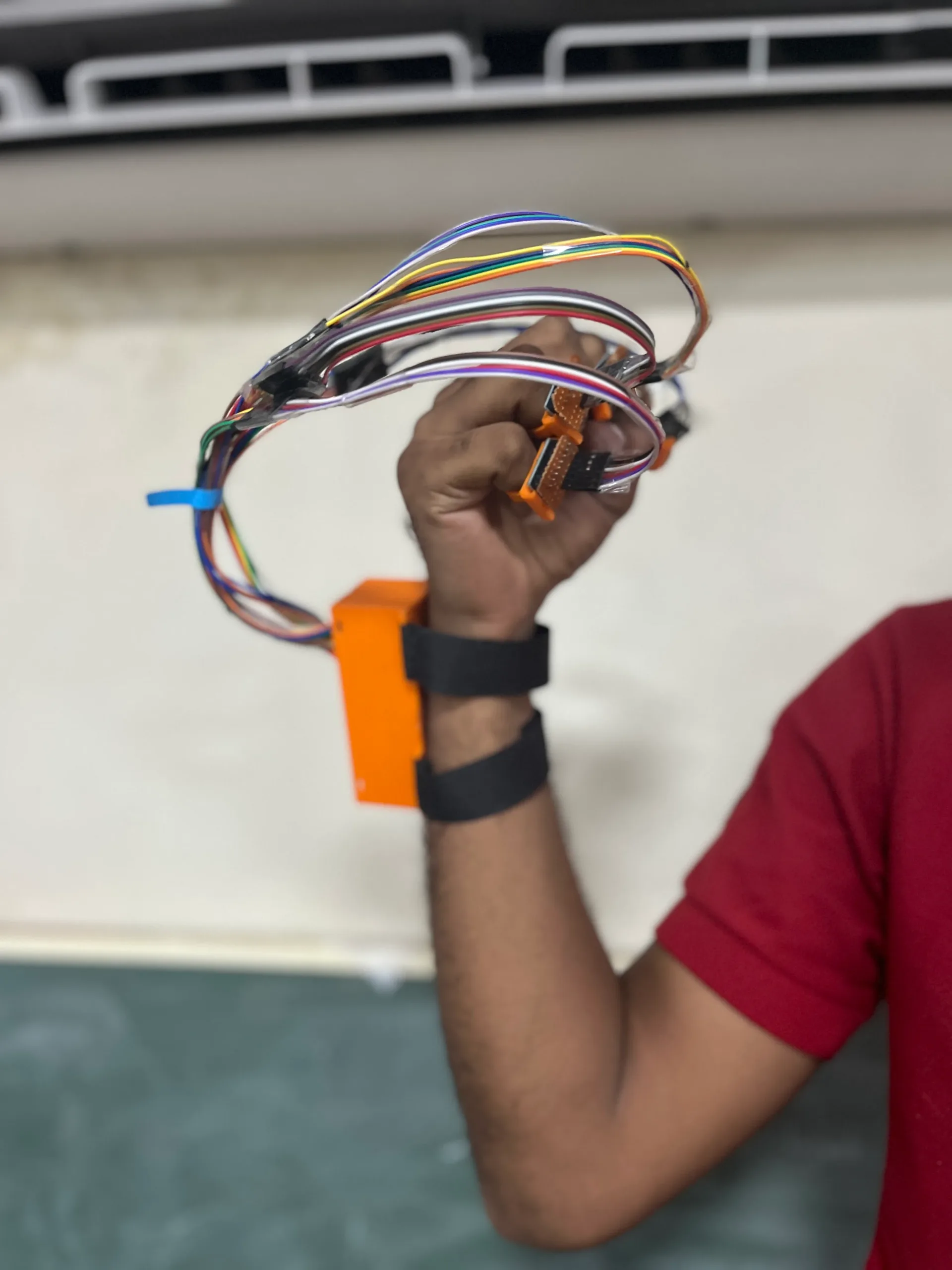Voicer device worn on the arm during a demo